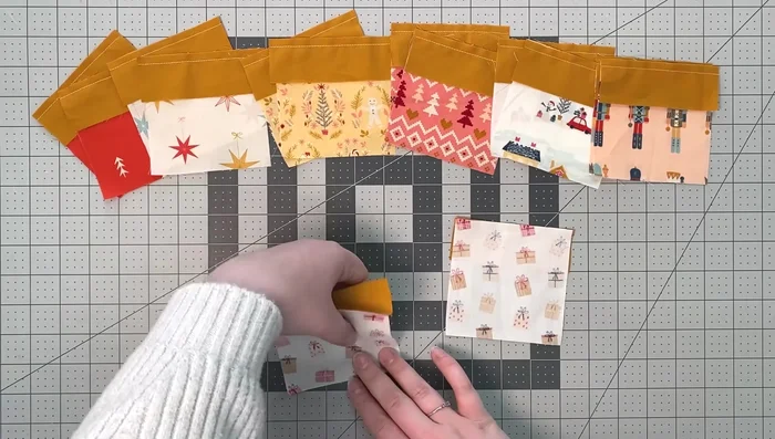 Press each seam to the side, alternating the direction for each piece.