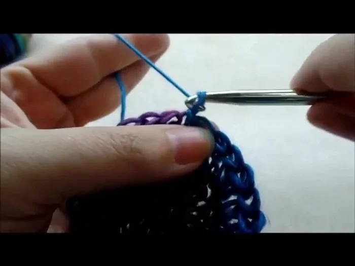 Chain 1, and single crochet in each stitch around. Repeat single crochet rounds until desired hat length is reached (approximately 25 rounds).