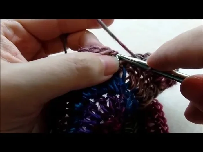 Chain 1, and single crochet in each stitch around. Repeat single crochet rounds until desired hat length is reached (approximately 25 rounds).