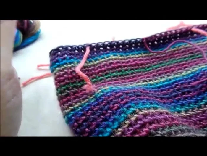 Repeat step 11, decreasing until 4 stitches remain on ear flap. Chain 1, turn, and single crochet decrease twice, then single crochet into last stitch. Fasten off.