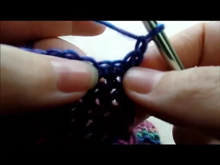 Repeat step 11, decreasing until 4 stitches remain on ear flap. Chain 1, turn, and single crochet decrease twice, then single crochet into last stitch. Fasten off.