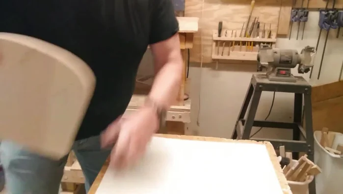 Create a template: Cut a 9x9 inch piece of poster board to determine the general shape of the magazine rack.