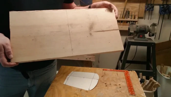 Cut the sides: Cut two identical pieces of 3/4 inch thick wood based on the template. Ensure they are perfectly symmetrical.