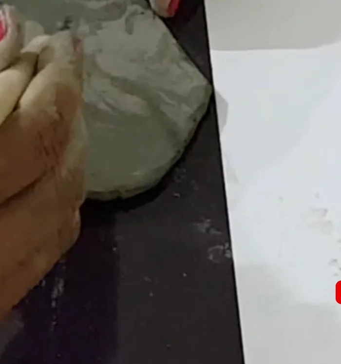 Make and attach the wings. Cut and shape the wings, then attach them to the body using water.