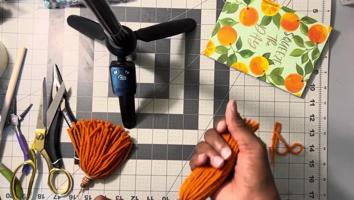 Cut off the excess wire after creating the loop. Sand the end of the wire to make it smooth against the ear.