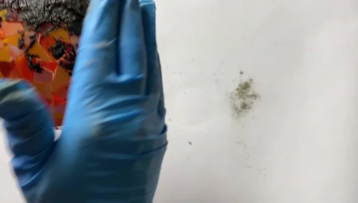 Apply the grout, pushing it into the grout lines.