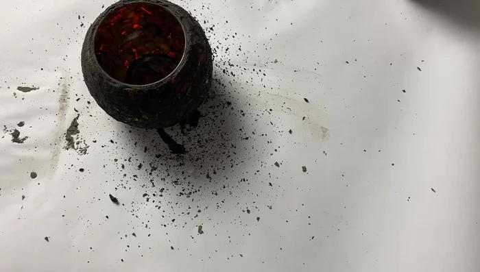 Remove excess grout using paper towels.