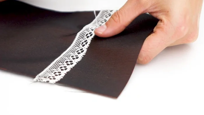 Optional decoration: Add any embellishments (lace, ribbons, etc.) before sewing.