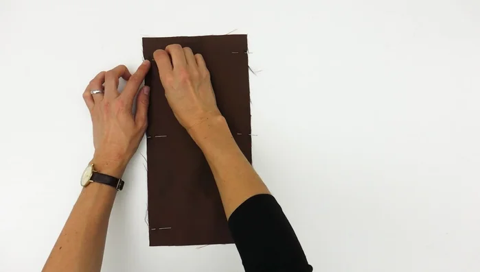 Sew the rectangles: Place right sides together, sew a 1cm seam allowance around 3 sides, leaving the top open. Reinforce the beginning and end of your stitching.