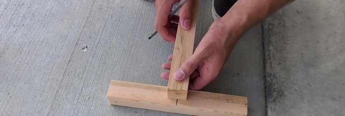 Mark and cut notches on the 11-inch pieces to create interlocking joints for the middle section of the plant stand.