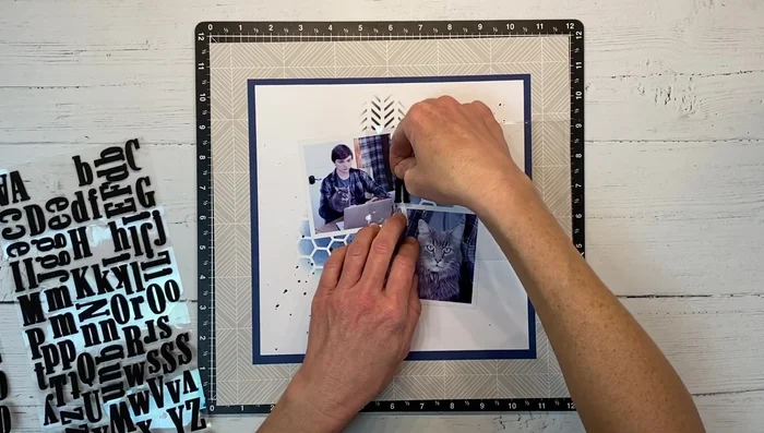 Embellishment: Add foam stickers, printed titles, or other embellishments to enhance the design. Consider layering to build visual interest.