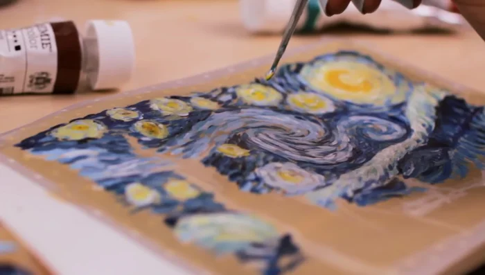 Go back and apply more blue paint, continuing to build layers with short brush strokes. Don’t strive for exact replication; focus on the technique.