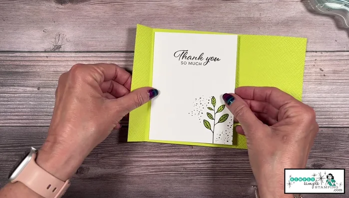 Assemble the first card: Adhere the stamped Basic White pieces to the card base using adhesive. Add Stampin' Dimensionals for dimension. Decorate with ribbon, using glue dots to secure the bow.