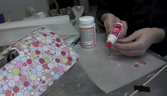 Attach a bail/jump ring using weld bond glue. Allow to dry completely.