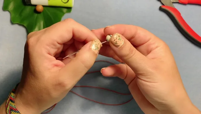 Pull the cord tightly so that all beads are flush against each other and no cording is caught in between.