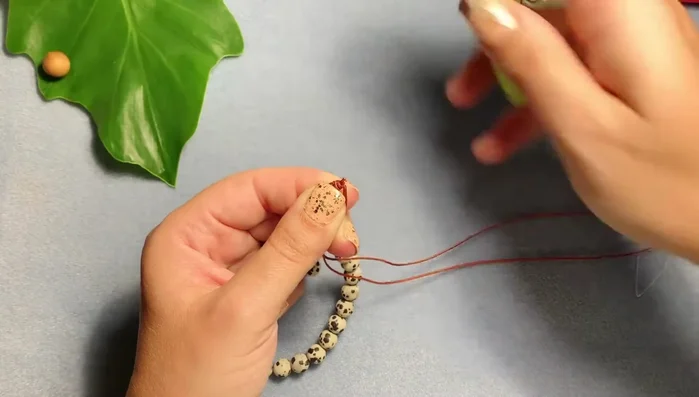 Burn the cut ends of the cord with a lighter to seal them.