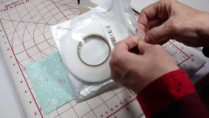 Sew the skirt to the bodice, hiding the gathering stitches.