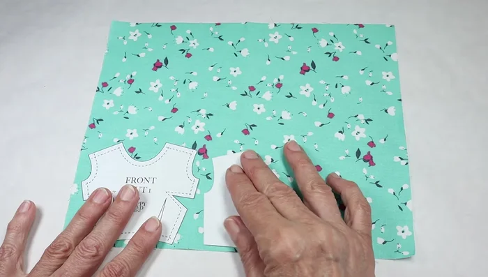 Cut out the fabric pieces following the traced pattern.