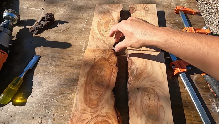 Sand the glued seams to create a smooth surface for epoxy.