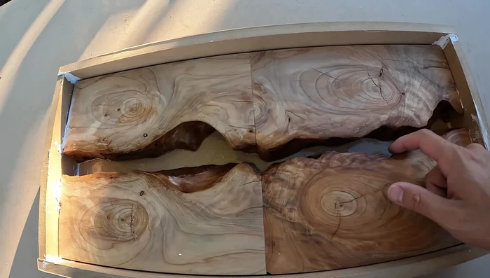 Pour and mix the epoxy resin with desired color pigments.