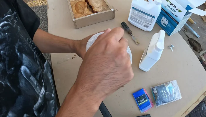 Allow the epoxy to cure completely. Perform additional epoxy pours as needed to fill any voids.