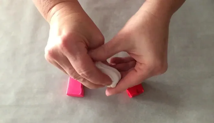 Roll out the combined clay to a thickness of less than 1/8 inch.