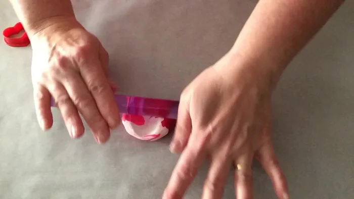 Roll out the combined clay to a thickness of less than 1/8 inch.