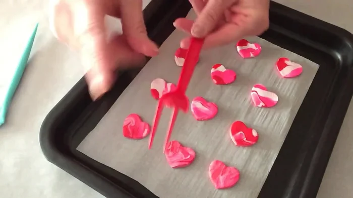 Use a tool (fork, toothpick, etc.) to make holes in the buttons.