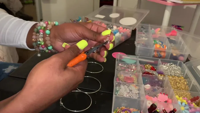 Attach split rings to each charm.