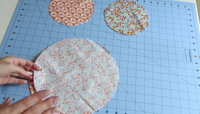 Turn right side out and press: Turn the sewn pieces right side out through the opening. Use your fingers to roll the seam allowances to the outside, creating a flat edge. Press with an iron to smooth the seams and remove wrinkles.