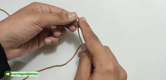 Join the first and last chains of the base to form a ring.