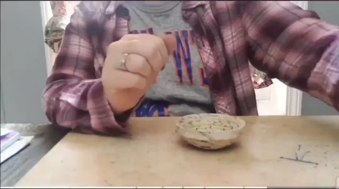 Glaze the bowl: Apply diluted white school glue (watered down) repeatedly to the inside and outside of the bowl, allowing each layer to dry before applying the next. Use a low oven (around 200°F) to speed up drying. Monitor constantly to prevent fire hazards.