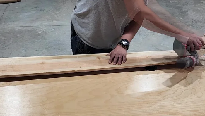 Cut the strips to the desired lengths using a miter saw (dimensions are provided in the linked plans).