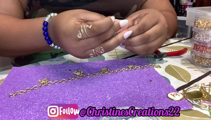 Attach a lobster clasp using a split ring. (856.33)