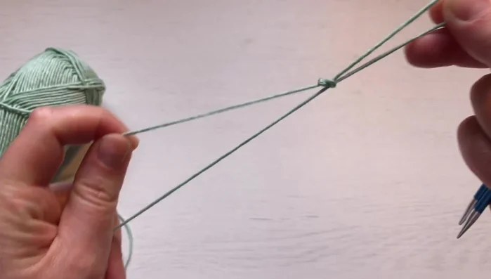 Cast on using the long tail cast-on method. Cast on enough stitches for one repeat of the leaf pattern.