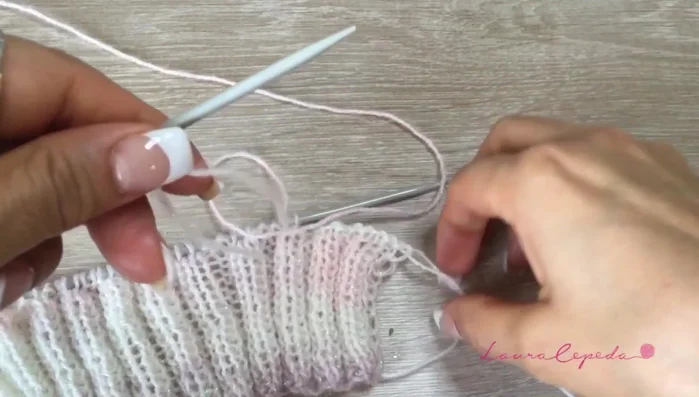 Continue knitting/purling in pattern, adding 17 stitches on each side at the end of the foot section.