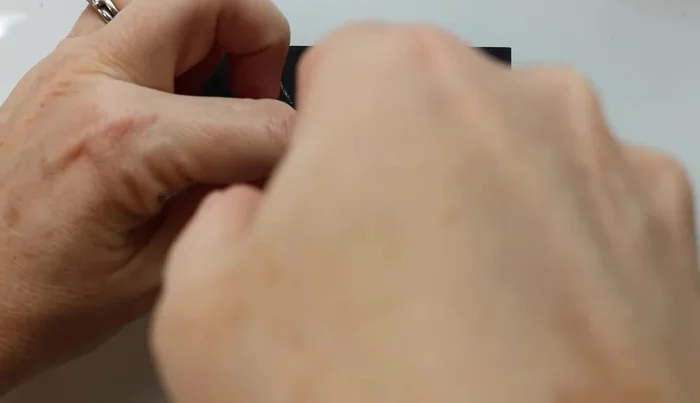 Dust off excess chalk: Remove any excess chalk from the surface to ensure proper paint adhesion.