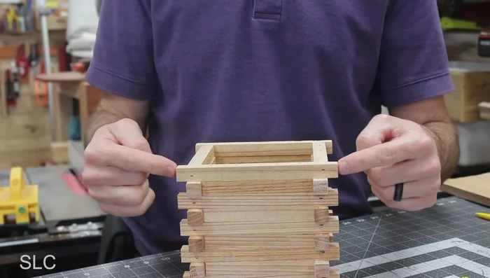 Construct the roof (7 1/2" - 8" long pieces) and attach, leaving it removable for cleaning.