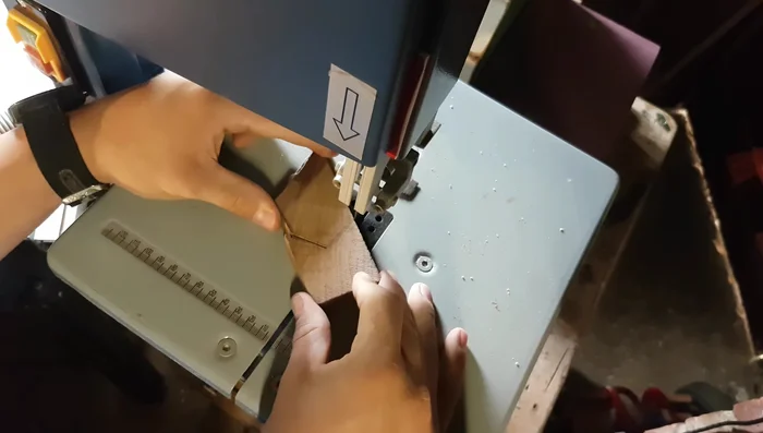 Cut out the design using a band saw.