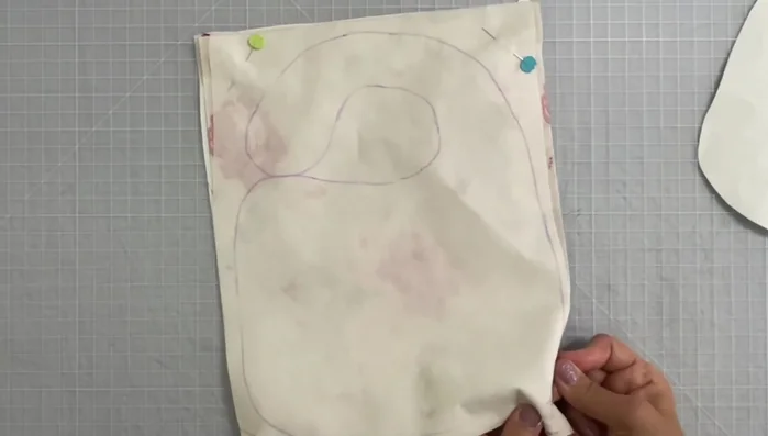 Cut into the neck area along the traced pattern line.