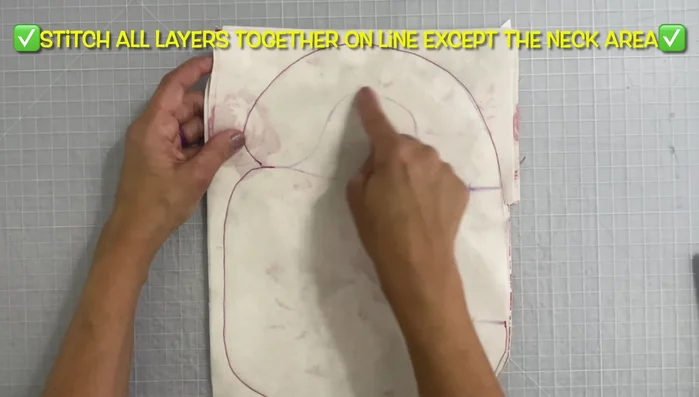 Cut into the neck area along the traced pattern line.