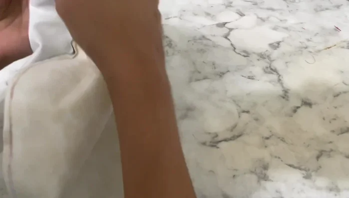 Top stitch around the entire bib and neck area.