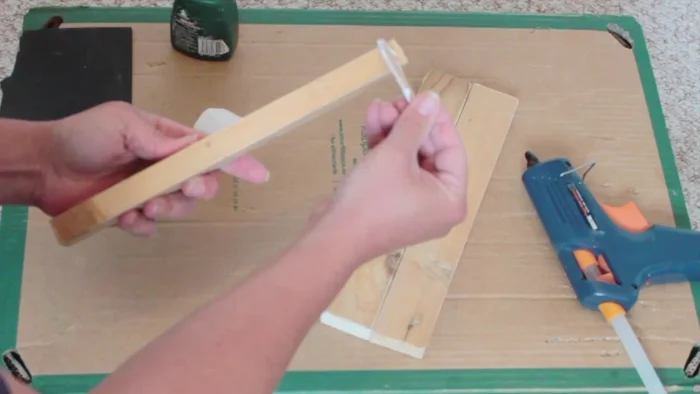 Let the paint dry completely (a couple of hours or overnight).