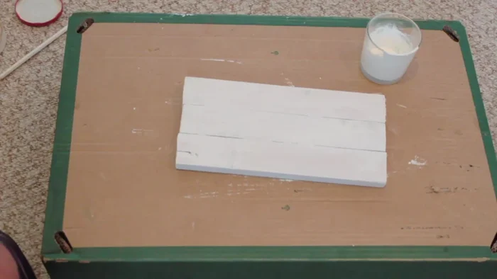 Let the paint dry completely (a couple of hours or overnight).