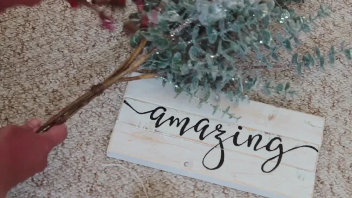 Add optional details like twine or ribbon, foliage and a bow using hot glue.