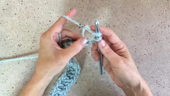 Row 3: Chain 1, turn, hdc in the front third loop across.