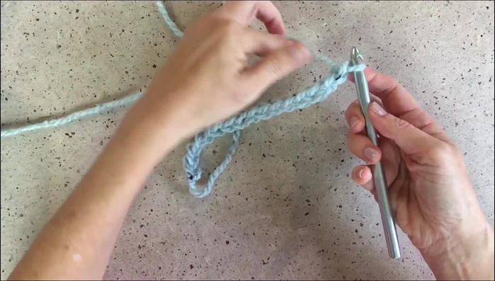 Make pockets: Chain 15, and then work seven rows of half double crochet in the front loop then the back loop, alternating. Single crochet around the bottom and sides; slip stitch around the top.