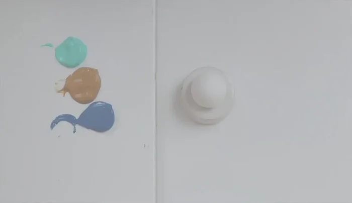 Prepare white polymer clay eyeballs and pre-bake them.