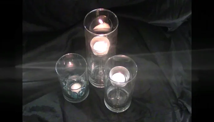 Optional: Add decorative elements like marbles, gems, or colored rocks inside the holders.