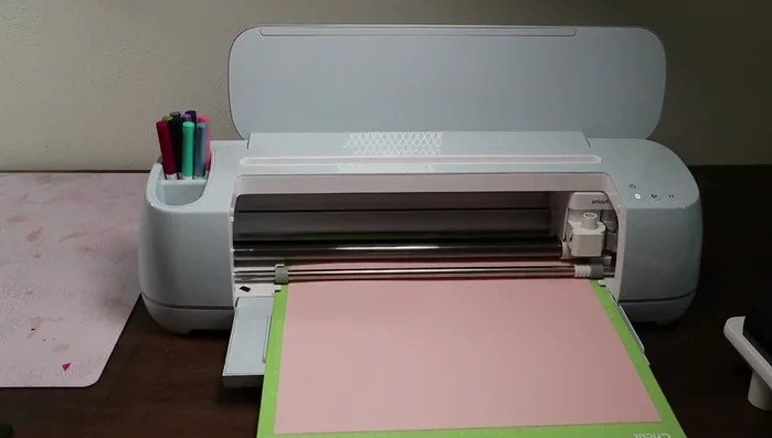 Use a scraper to remove any leftover confetti pieces from the mat.